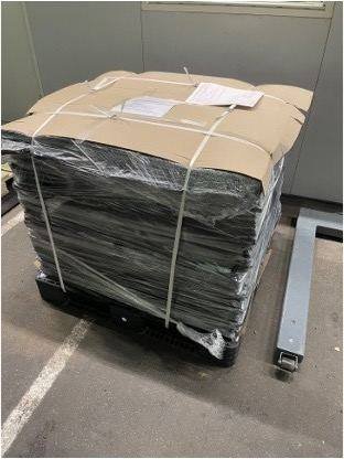 Processed rubber material packed for transport